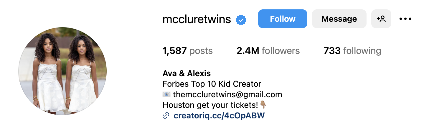Instagram profile header of the McClure twins weearing white dresses